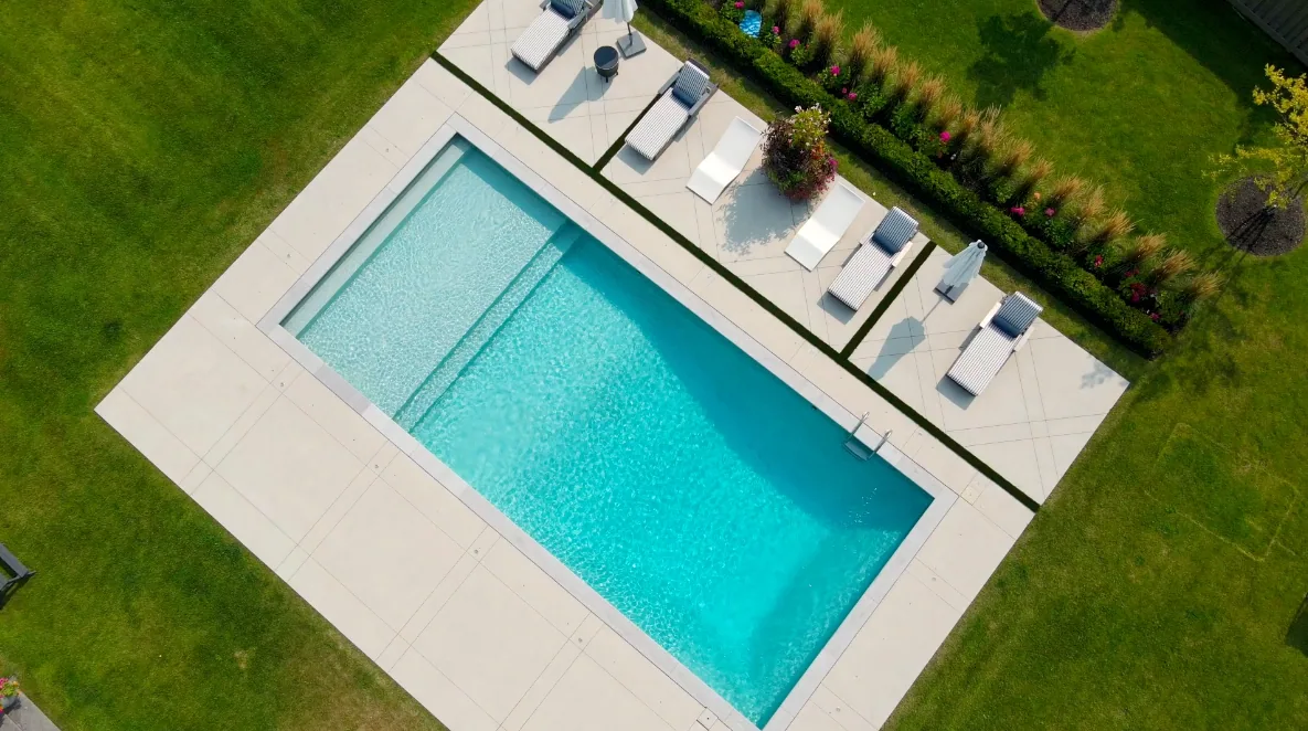 Aerial view of a rectangular pool and deck