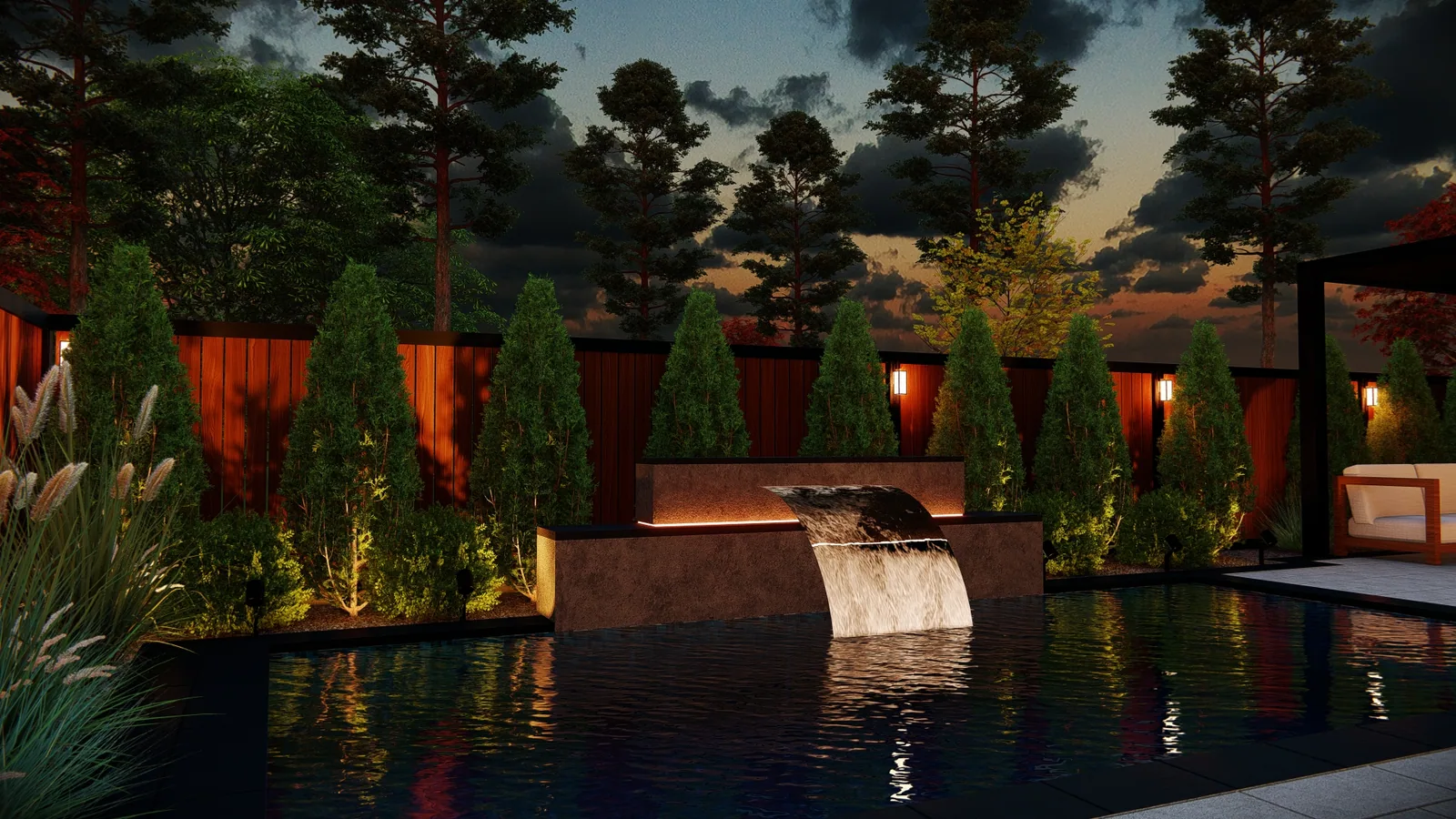 The same sheer descent waterfall wall at night, lit with landscape lighting