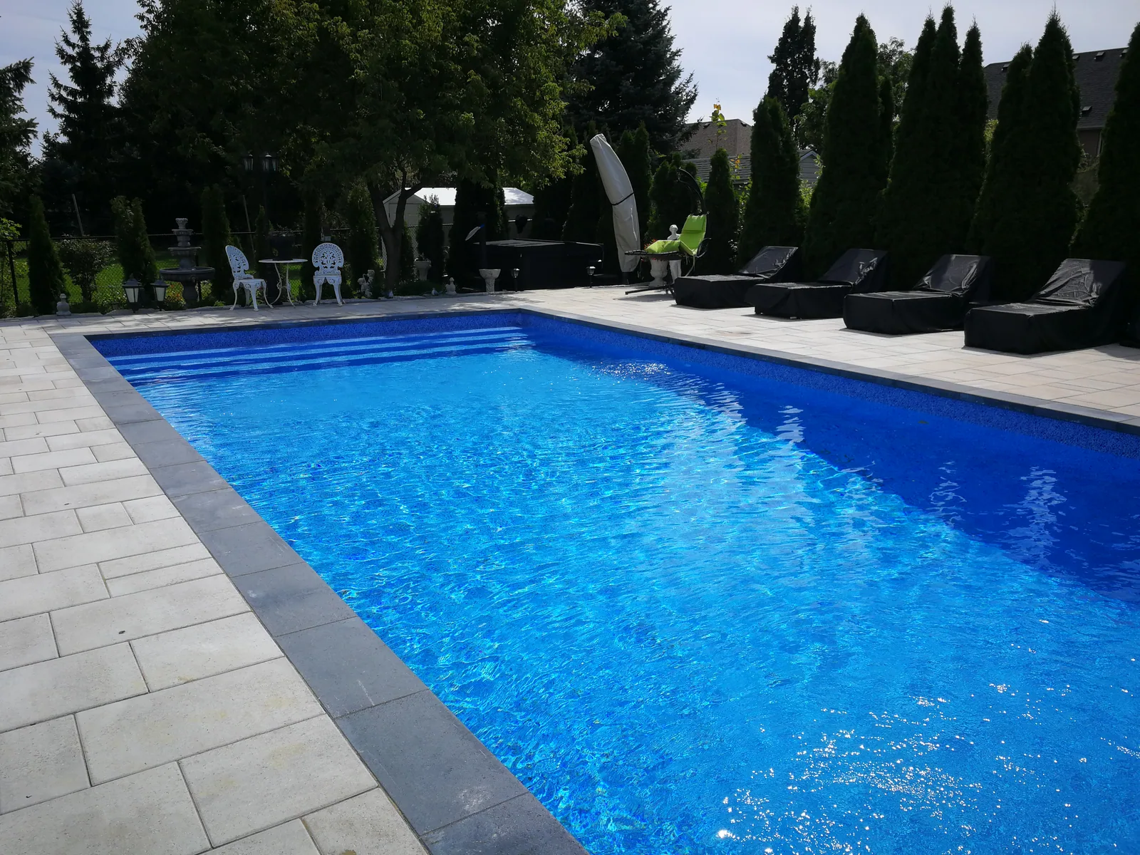 Rectangular inground pool with loungers, Richmond Hill Ontario
