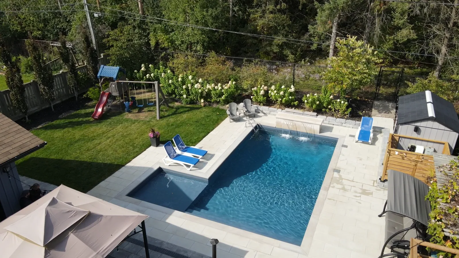Family pool with lawn and playset, Kleinburg Ontario